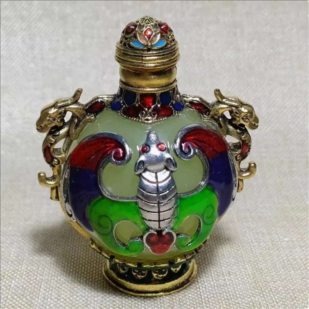 

Retro luminous double-sided copper inlaid cloisonn é snuff bottle with interior painting