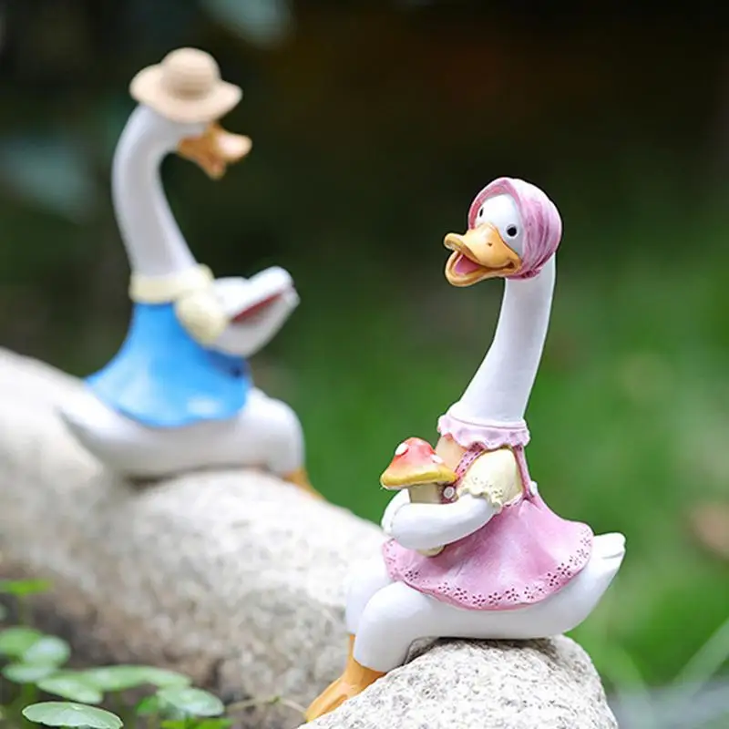 

Funny Cartoon Garden Duck Lovers Sculpture Duck Figurines Reading Book Pose Resin Outdoor Lawn Ornaments Statues Outside With