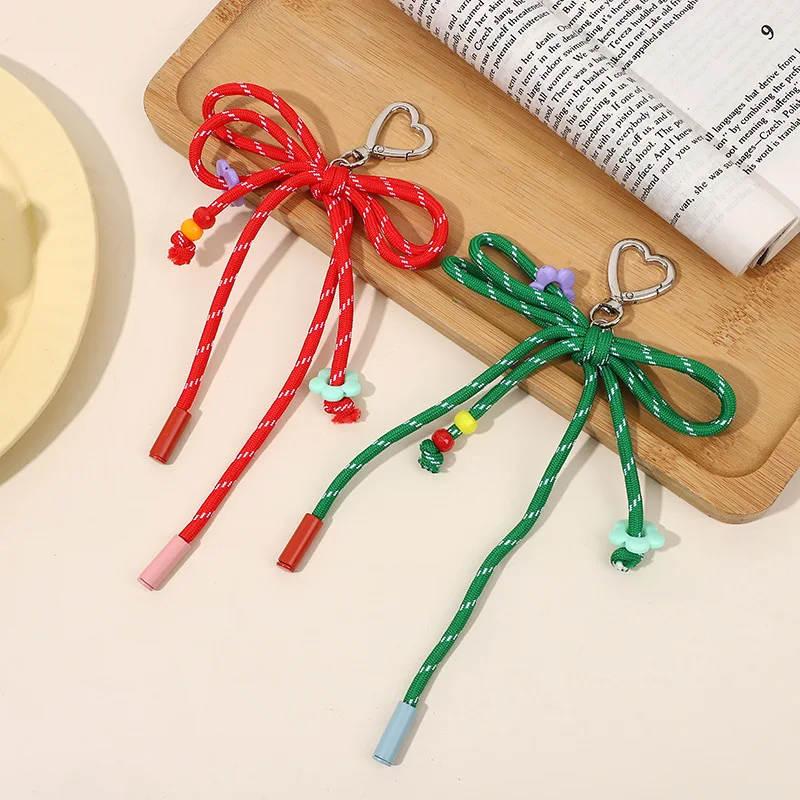 

Candy-Colored Yarn Bow Keychain - Handmade DIY Craft with Heart Charms, Durable Polyester Cord for Women's Bags, Keys,