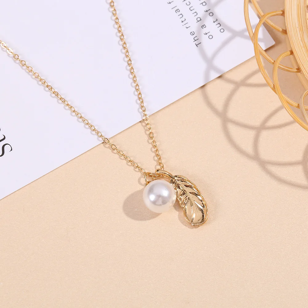 New Gold Feather Pearl Light Luxury Versatile Neckchain Collar Chain Necklace Female Jewelry Wholesale And Retail Mainland China