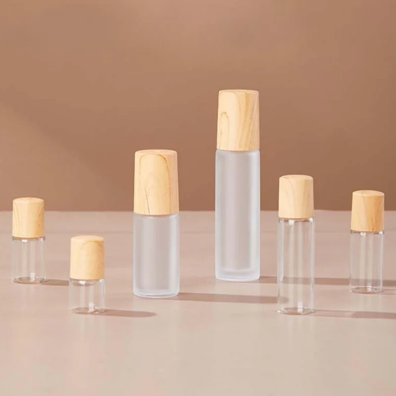 1/5pcs Bottiglia di vetro smerigliato Dispenser di profumo Bottiglia cosmetica Coperchio di venature del legno Bottiglia di perline rotolanti Sfera