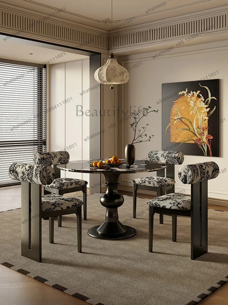 French black natural luxury stone marble dining table and chairs high-end household solid wood round table combination