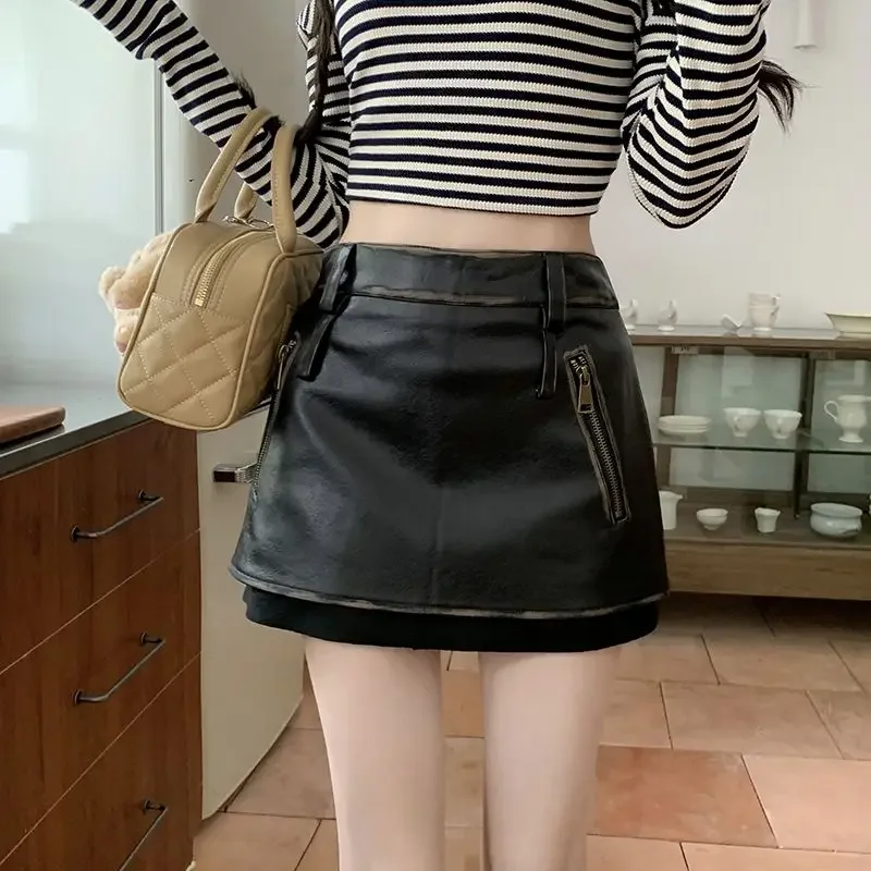 Retro black PU leather skirt, half body  women's autumn and winter  spicy girl skirt, high waist A-line wrapped hip skirt