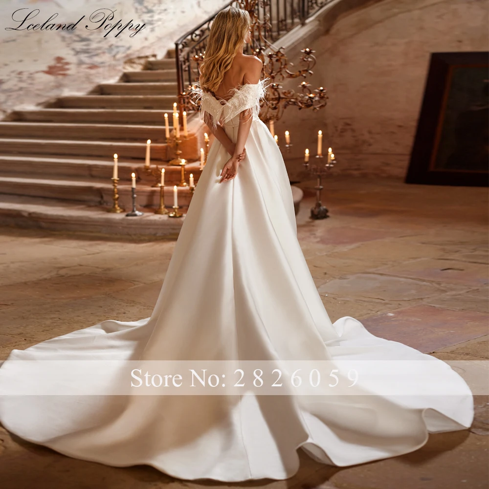 Lceland Poppy Customized A Line Boat Neck Satin Wedding Dresses Beaded Bridal Gowns with Feathers