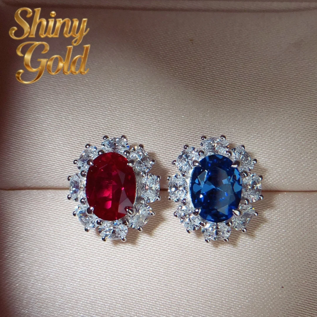 

Серьги-гвоздики ShinyGold из белого золота 18 карат с сапфирами и рубинами овальной огранки 6x8 мм (1,5 карата каждый) и лабораторными бриллиантами E057