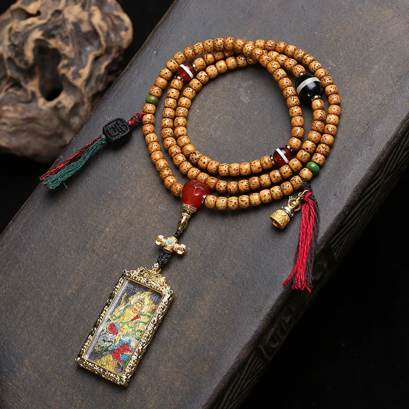 

Tibetan cultural ornament, Yellow God of Wealth, Tangka Buddha pendant, sweater chain, agate ebony wood accessory,