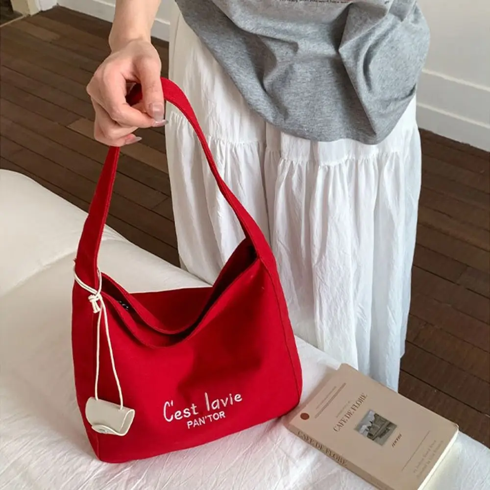 

Trendy Korean Letter Shoulder Bag Canvas Large Capacity Student Tote Bag Casual Versatile Women's Armpit Bag Handbag