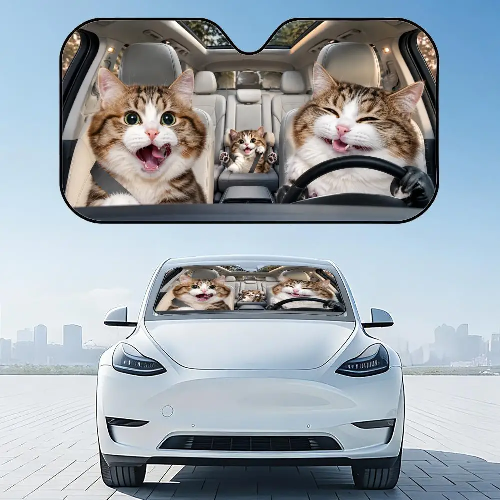 A five-layer thick car windshield sunshade with a funny graphic print of fluffy cartoon cats driving a vehicle.