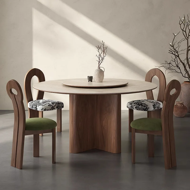 

Retro travertine rock slab round dining table and chair combination modern simple home guest restaurant French medium and ancien