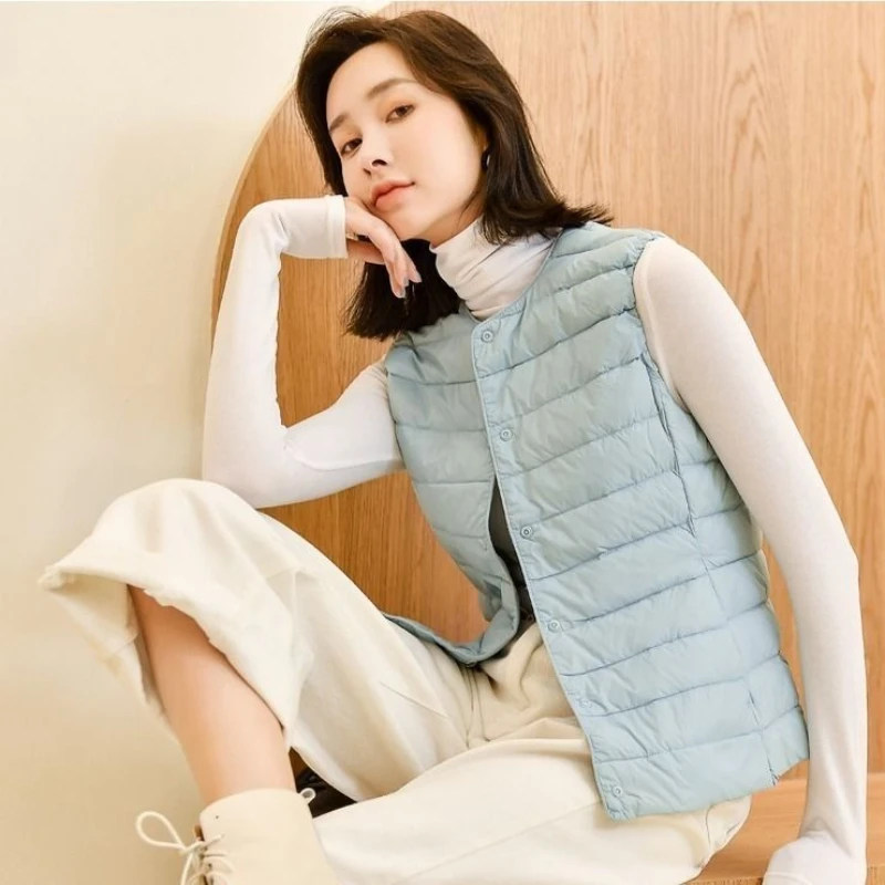 Feminino ultra leve para baixo colete longo com casual fino 90% pato branco para baixo gilet novo 2025 moda venda quente