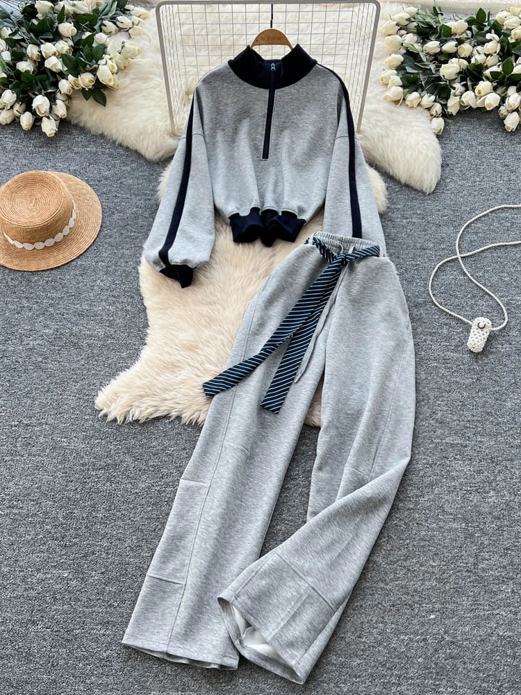 ชุดเซ็ตเสื้อฮู้ดแขนยาวสไตล์เรโทรอเมริกันสีตัดกัน กางเกงขายาวเอวสูงทรงขากว้างสำหรับผู้หญิง ชุดลำลองแฟชั่น