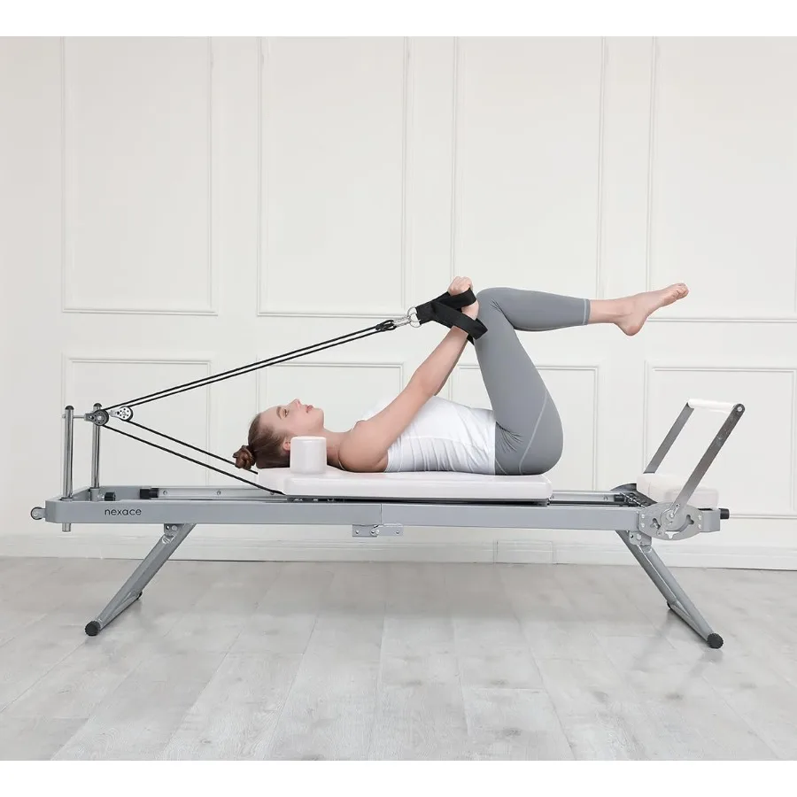 

Складная машина для пилатеса-реформера для домашнего использования Компактное оборудование для фитнеса черного цвета с регулируемым сопротивлением и плавным управлением