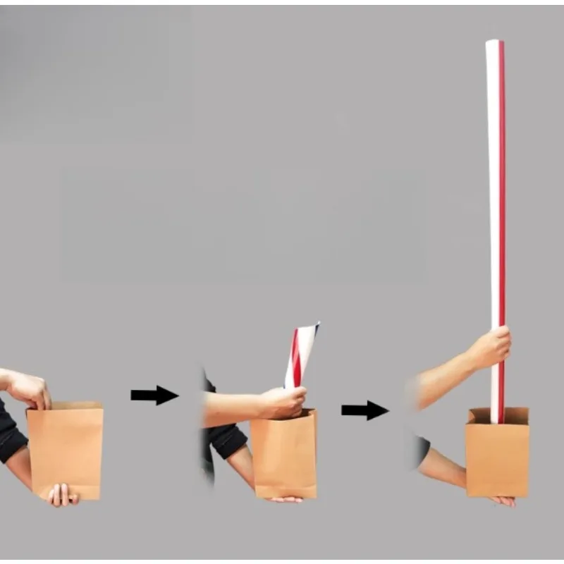 

Волшебный трюк, появляющийся большой соломинку из пустой сумки - Иллюзионный сценический реквизит крупным планом, игрушка-волшебник для забавных уличных выступлений