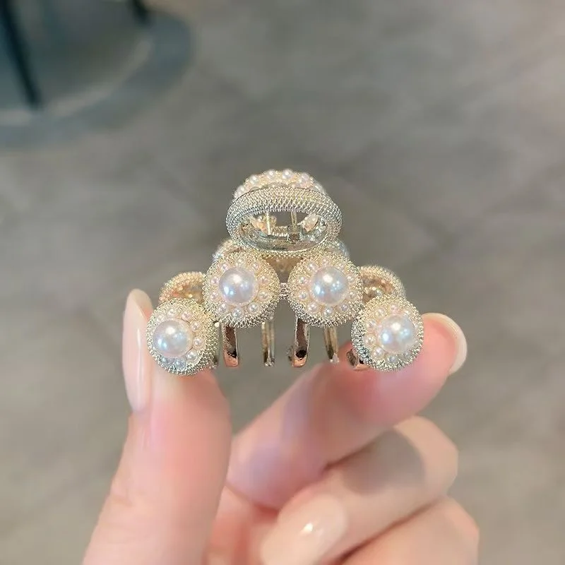 2025 Fermagli per capelli con perle per ragazze alla moda