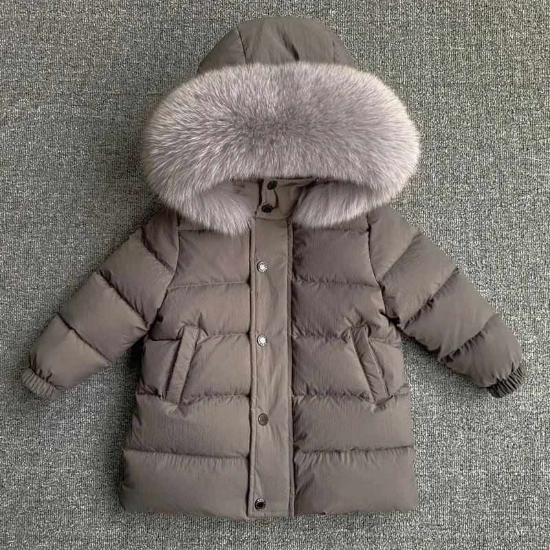 Nuovo piumino invernale per bambini collo di pelliccia reale di lusso per bambini addensare caldo cappotto di media lunghezza per neonato ragazza