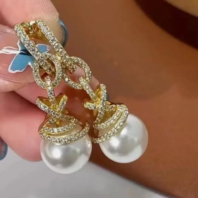 

Великолепные висячие серьги с белым жемчугом Южного моря 10-11 мм, 925-х годов