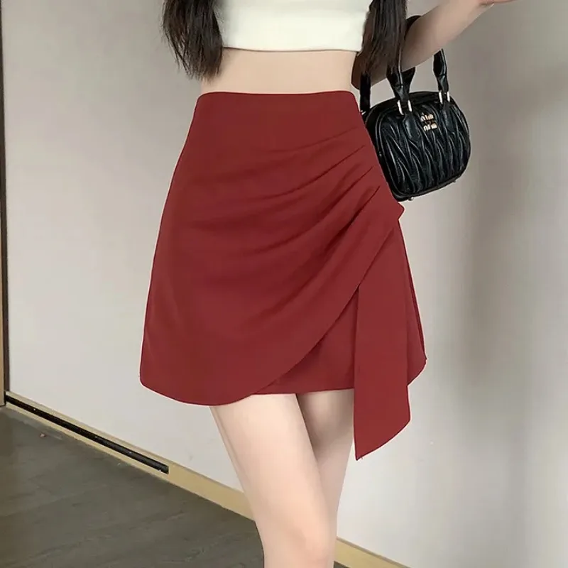 

Женская асимметричная мини-юбка с высокой талией, оборками и эффектом запаха