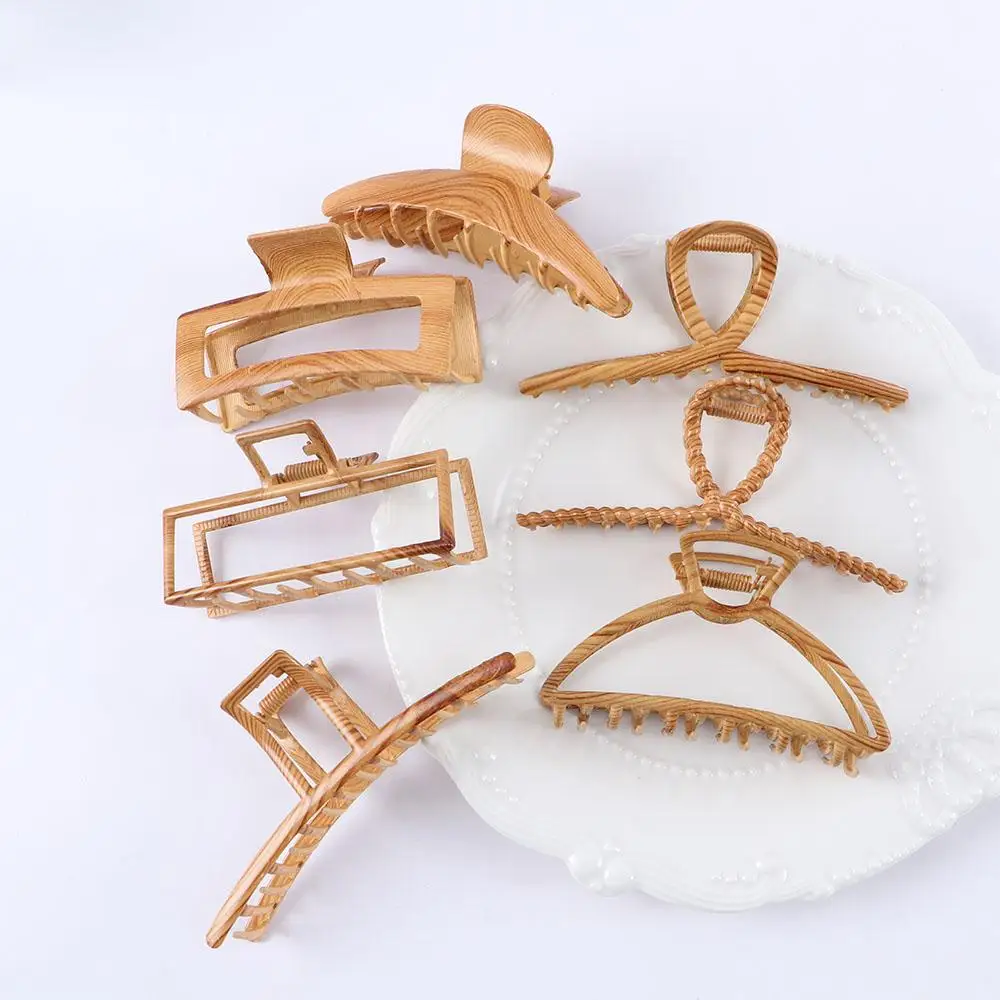 

Дизайн, геометрический темперамент, цвет дерева, корейский стиль, коготь для волос, зажим в виде акулы, женские аксессуары для волос, когти для волос под дерево