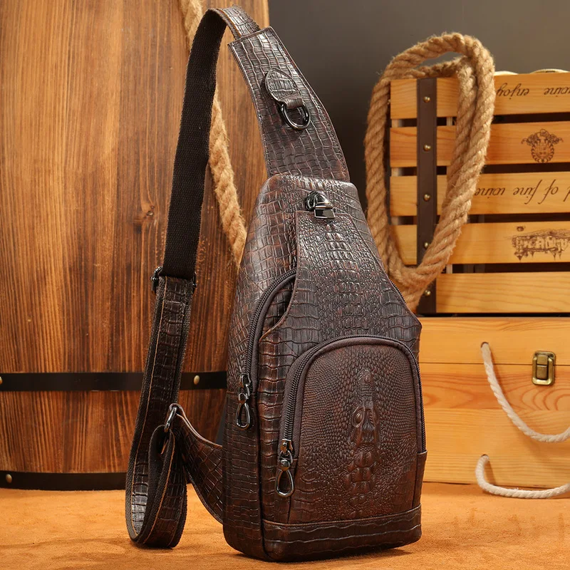 Crocodile-patterned crossbody bag for men, made of genuine leather, trendy for the street, with a shoulder strap design.