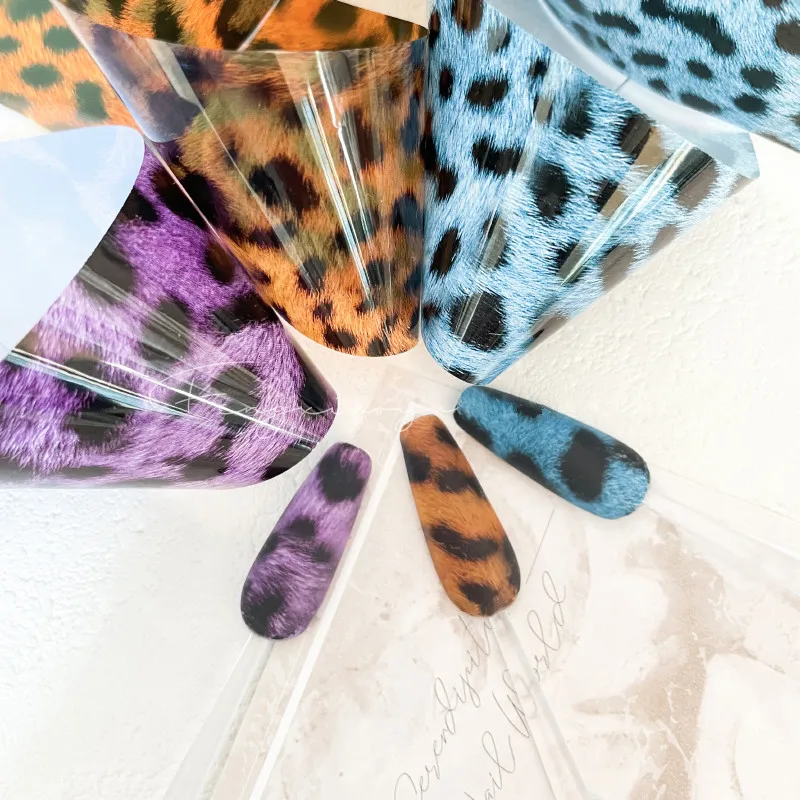 Carta di trasferimento della stagnola del chiodo della stampa del leopardo fogli di arte del chiodo ambra fiamma animale per le decorazioni di arte delle unghie del fuoco decalcomanie di Sanke