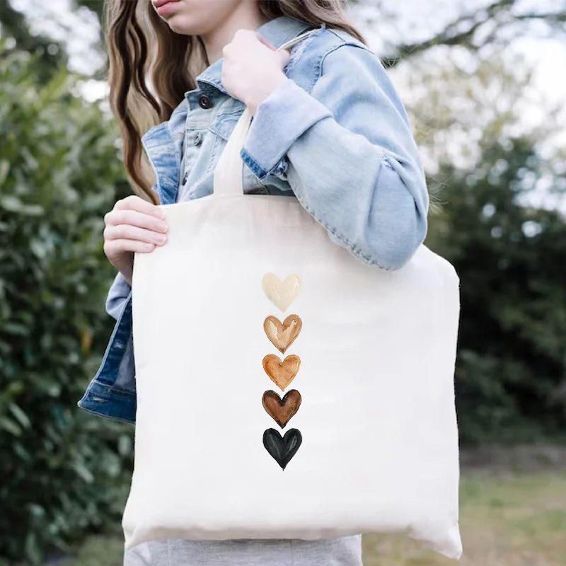 حقيبة نسائية عادية ذات سعة كبيرة حقيبة كتف قماشية موضة Harajuku للمتسوقين الحد الأدنى المائية القلب طباعة حقائب الشارع