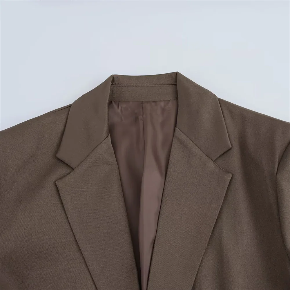 UNIZERA dameskostuum met tailleband en reversknoopzakversiering voor de lente nieuwe damestop