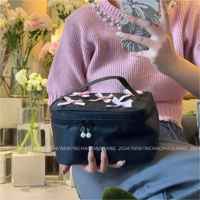 Borsa per il trucco con fiocco da donna borsa per cosmetici portatile di grande capacità borsa da toilette da viaggio d\'affari