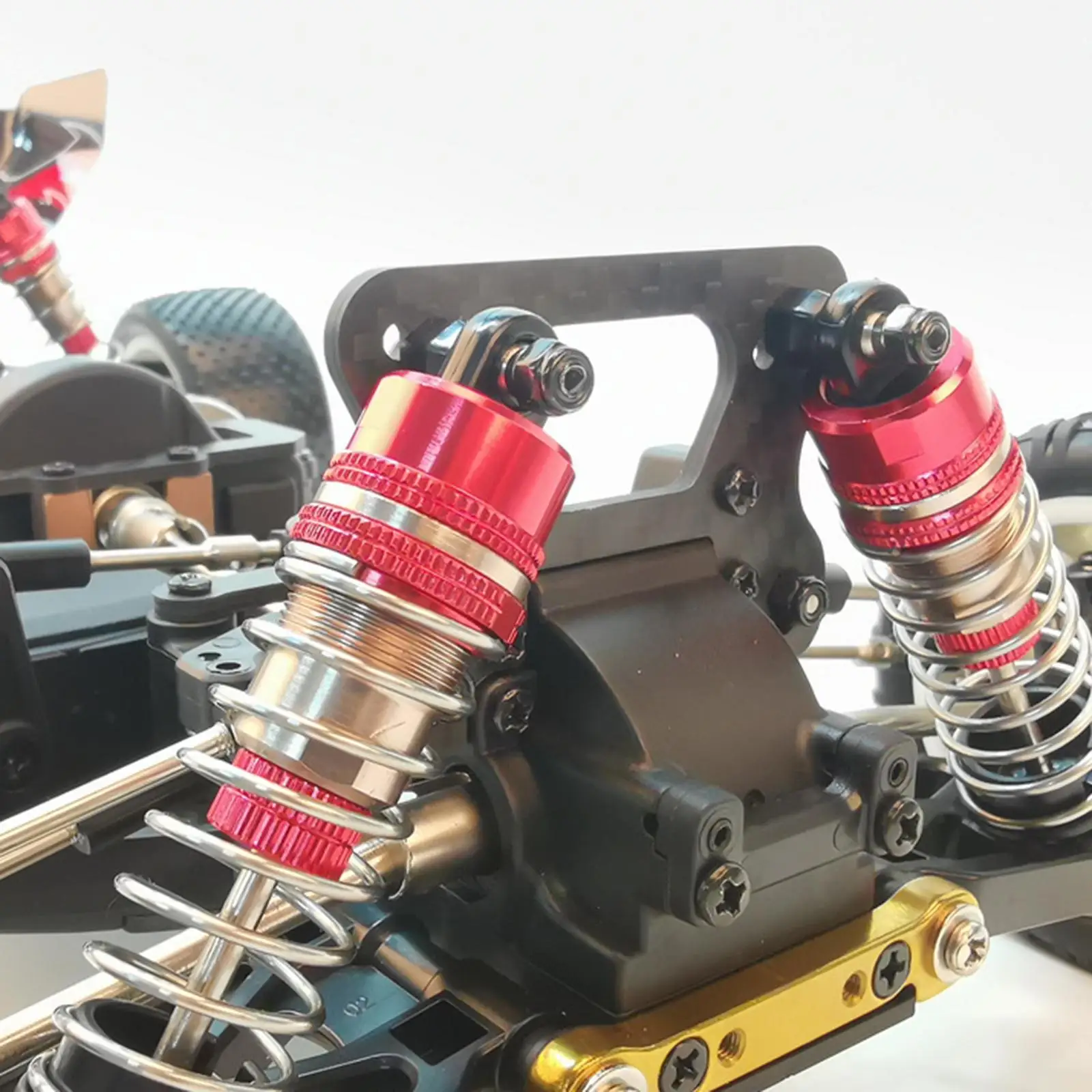 

Карбоновые передние и задние амортизационные стойки в масштабе 1:10 с основным шасси для Wltoys