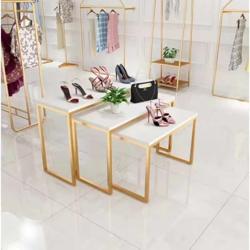 

Customize.Boutique Gold Clothing Wall Rack Nesting Table Clothes Shelving Garment Display Rack Clothing Store
