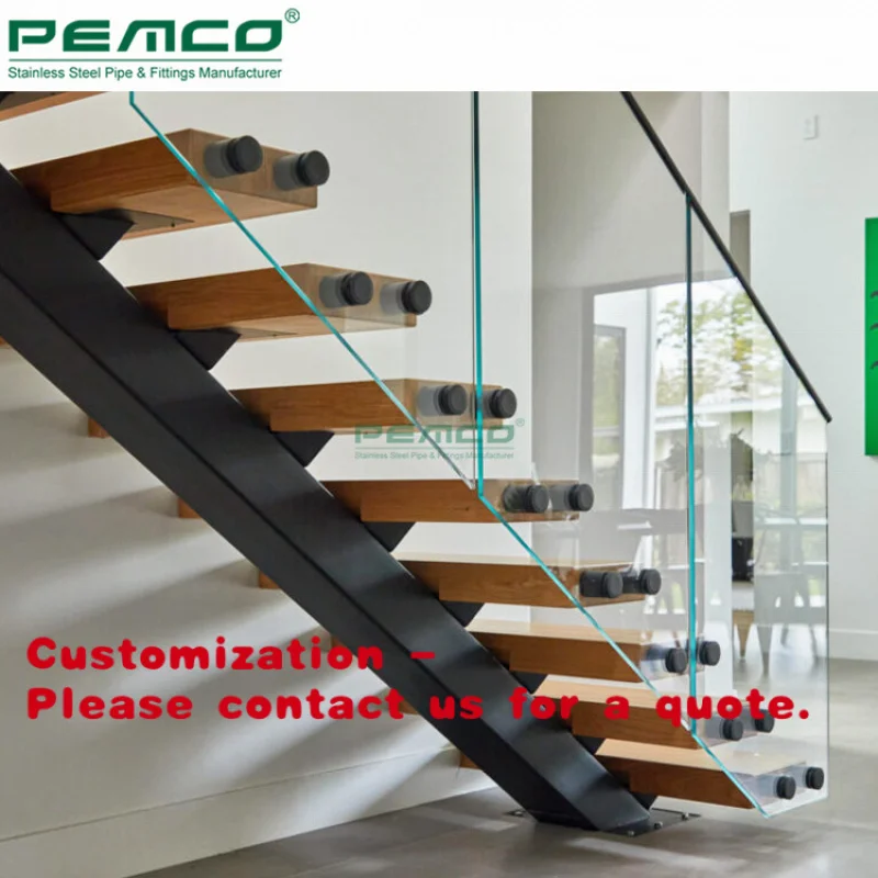 

Индивидуальная система стеклянных перил для лестниц из нержавеющей стали. Дизайн черных стеклянных ограждений для лестниц с креплением на опорах.