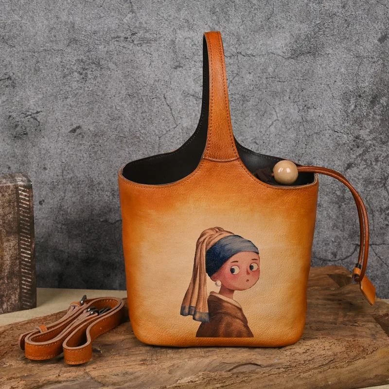 Johnature 2026 New Genuine Leather Retro Printed Handmade Drawstring Bucket Bag Handbag Versatile Women's Bag