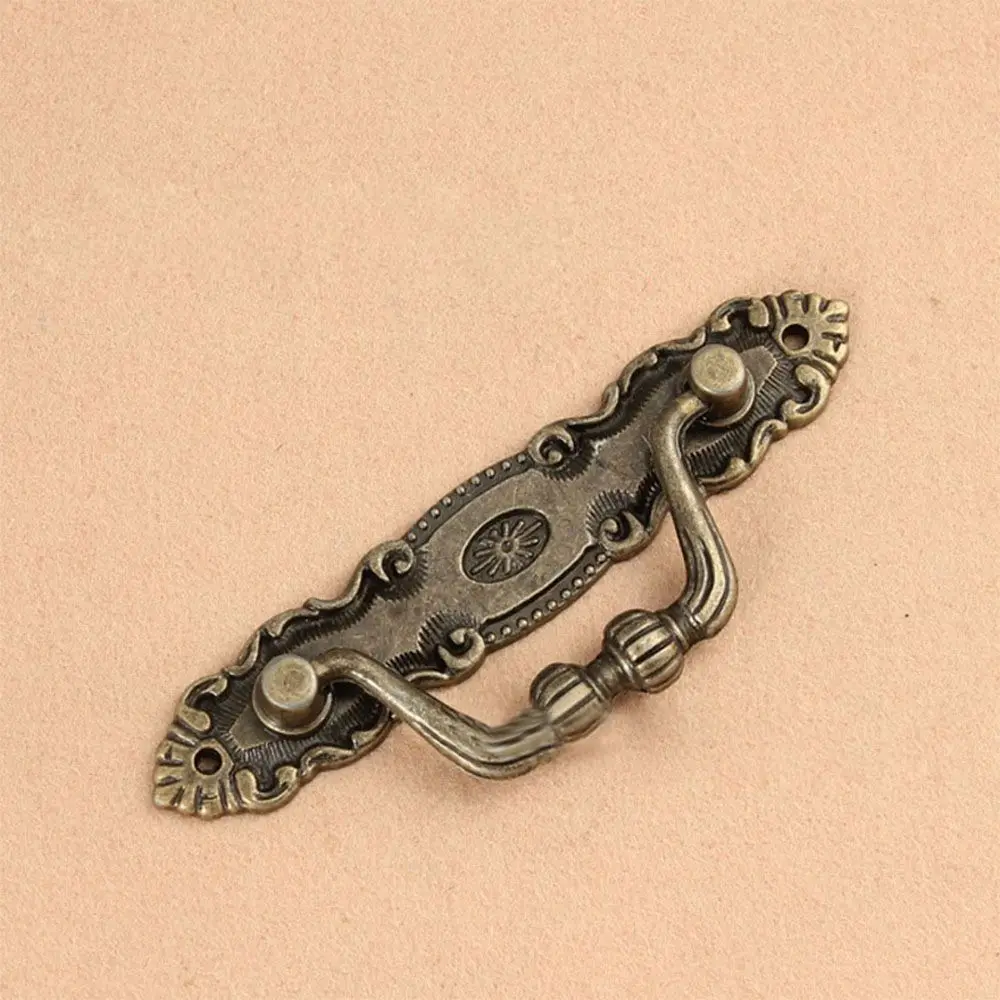 Tiradores de armario de arte Vintage, puerta de tocador, cajones, tiradores de armario de bronce de aleación de Zinc moderno europeo