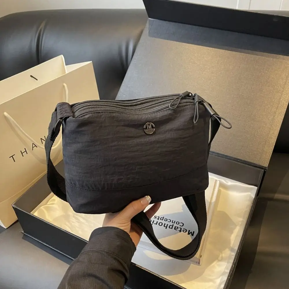 

Многофункциональная нейлоновая сумка через плечо, нишевая дизайнерская водонепроницаемая сумка на молнии, однотонная маленькая сумка для телефона в корейском стиле для девочек