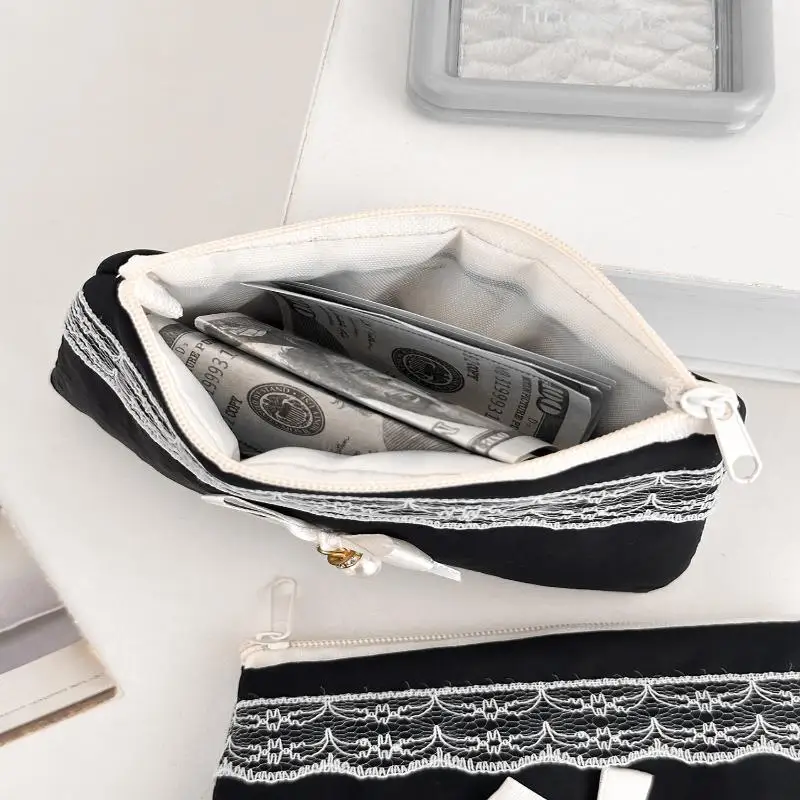 Schwarze Spitzen-Schleifen-Kosmetiktasche mit großer Kapazität, Reise-Kosmetik-Organizer, niedliche koreanische tragbare Tasche für Frauen – Detail 4