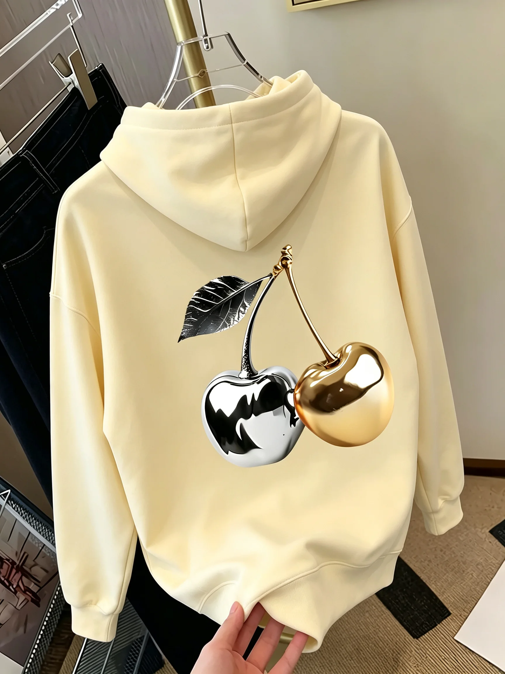 Golden cherry printed women's hoodie - fashionable casual top with elegant style. Multi-purpose and simple design for women tops