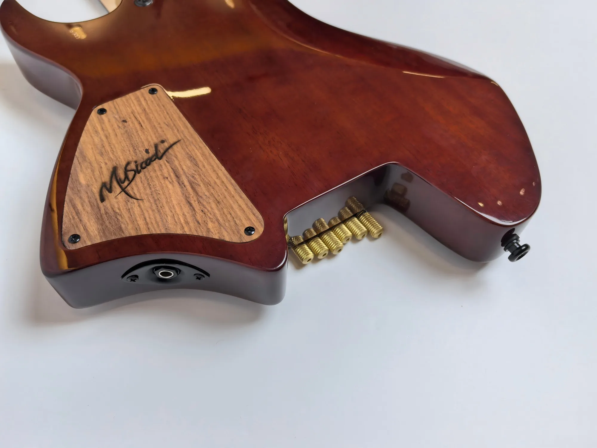 Factory directly selling, African peach heartwood, headless electric guitar, sour tree fingerboard, in stock , can customized