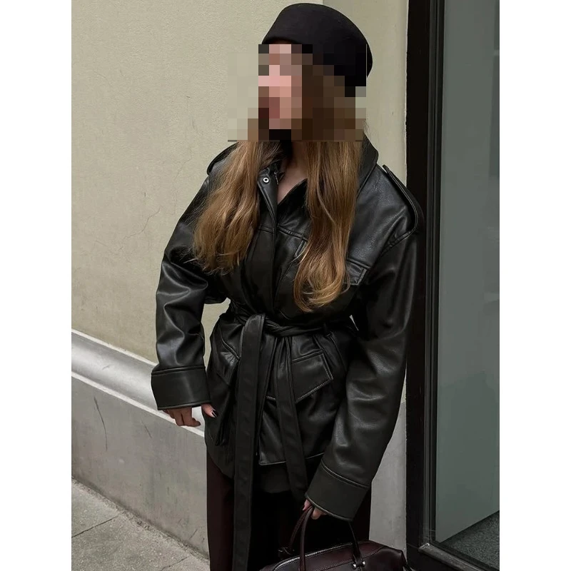 Korean version of niche versatile waist thin medium and long handsome locomotive leather jacket