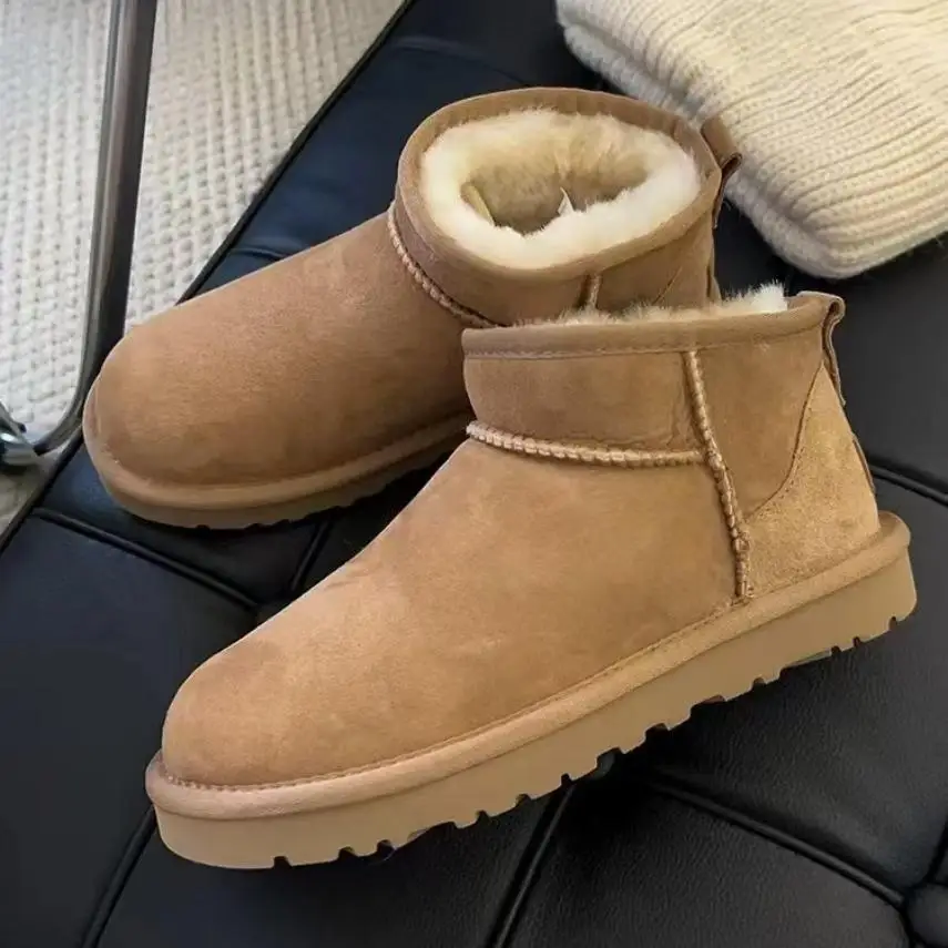 2025 botas de invierno botas de nieve de piel para mujer piel de oveja auténtica zapatos de piel cálidos de corte bajo botas cortas de invierno para hombre y mujer Super Mini
