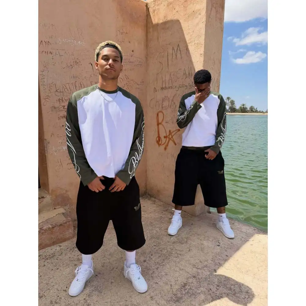 Personality fashion letter printed round neck long sleeve T-shirt with retro street trend stitching T-shirts for men and women. view 3