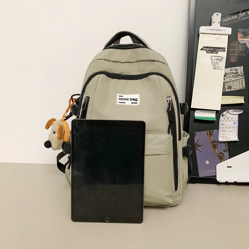 Nova moda feminina dos homens de alta capacidade à prova dwaterproof água faculdade mochila na moda feminina portátil sacos escolares bonito menina viagem saco livro legal