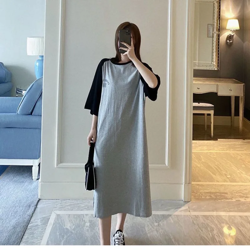 

2023 New Summer Fashion Simple Round Neck Oversized Western Style Slim Covering Belly Loose Relaxed Mid Length T-shirt Skirt