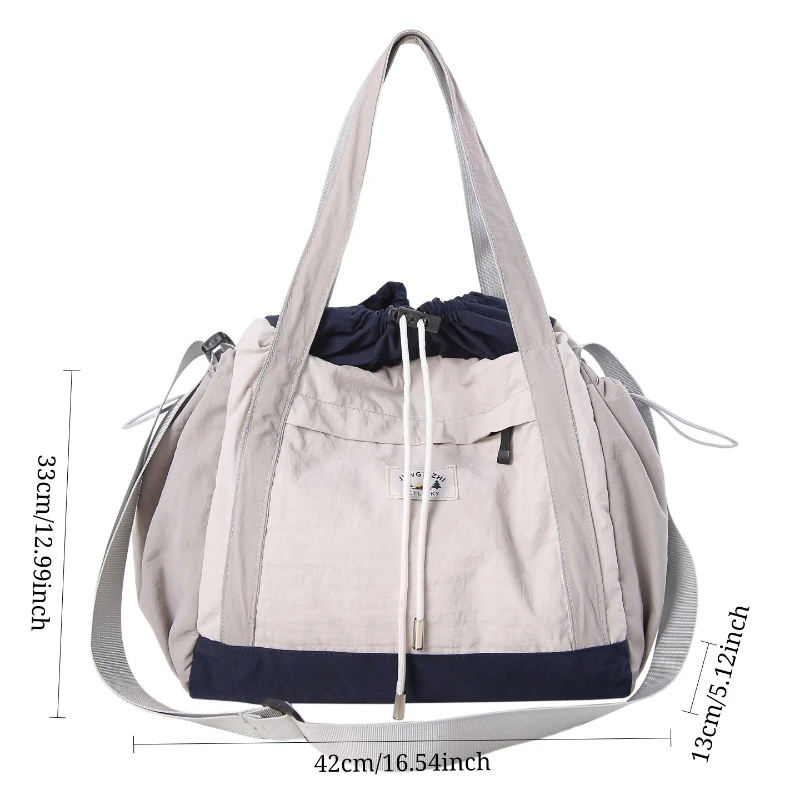 Nieuwe wintertextuur Versalite Crossbodytassen Grote capaciteit Kleurblok Eenvoudige emmertas Lichtgewicht casual stoffen schoudertas