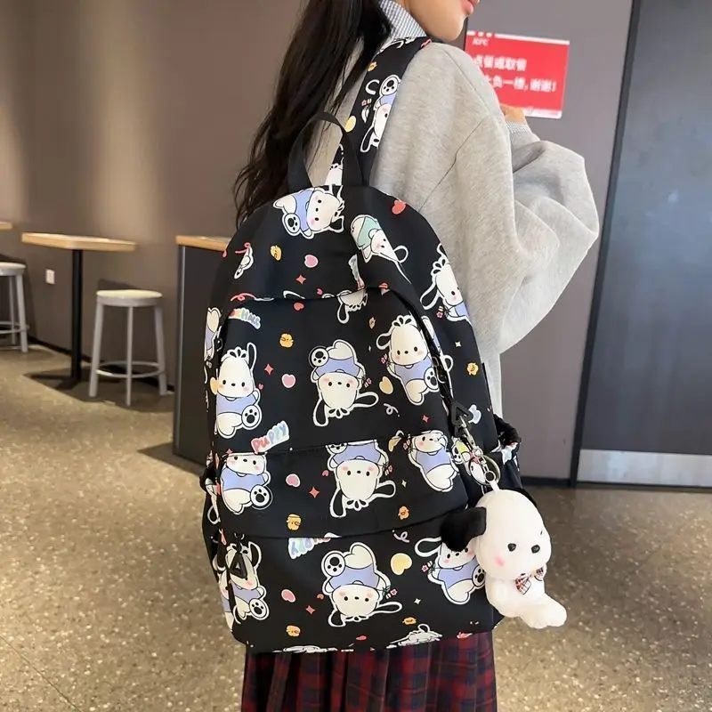 

Новый стильный рюкзак Sanrio для девочек Pochacco, детская модная школьная сумка, корейский универсальный рюкзак с мультяшным принтом, пара граффити