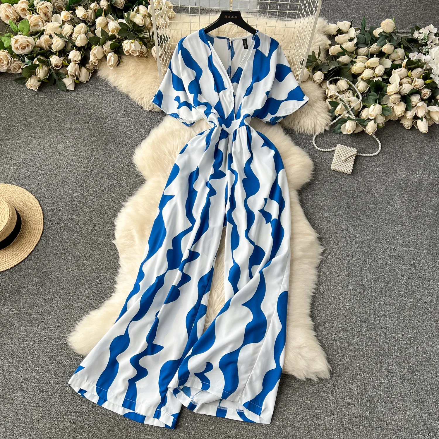 Tuta estiva casual da donna stampata a gamba larga con scollo a V femminile manica corta a sbuffo vita alta pagliaccetto allentato drappeggiato