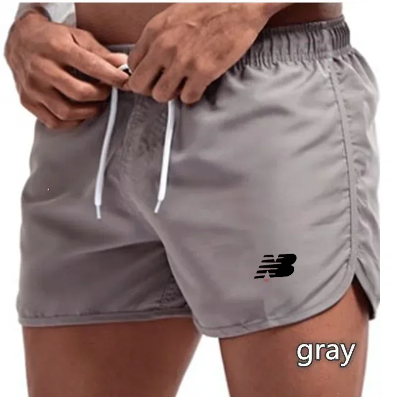 Bañador de secado rápido para hombre y mujer, ropa de playa de lujo, pantalones cortos para fitness y correr, 2024