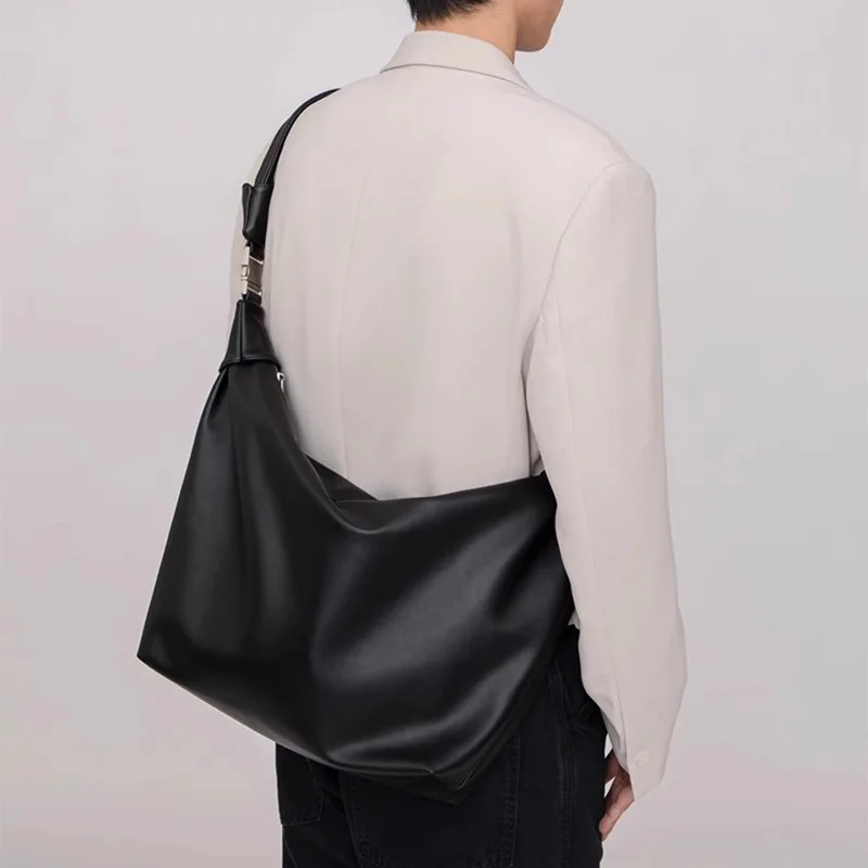 

Simple Soft Leather Men's Dumpling Bag 2024 New Men's Cross-body Bag Solid Color Commuter Bag Female Tide