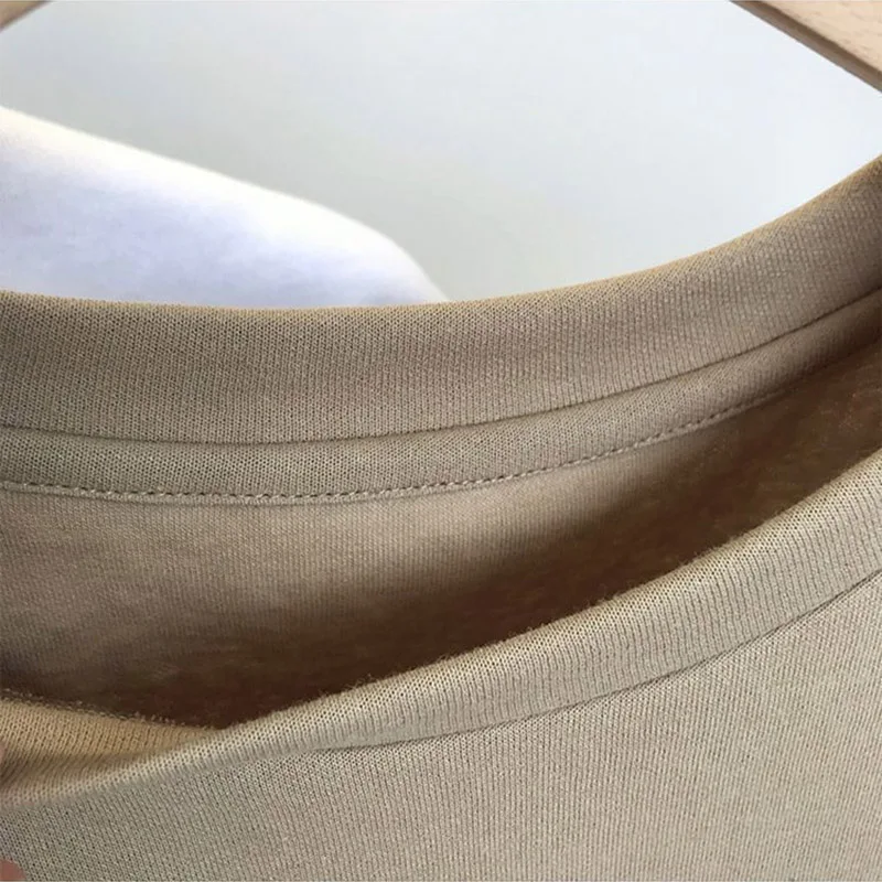 夏中空 Tシャツ女性のためのラウンドネック半袖 5XL バックレストップ韓国カジュアルファッション無地シックな Tシャツ