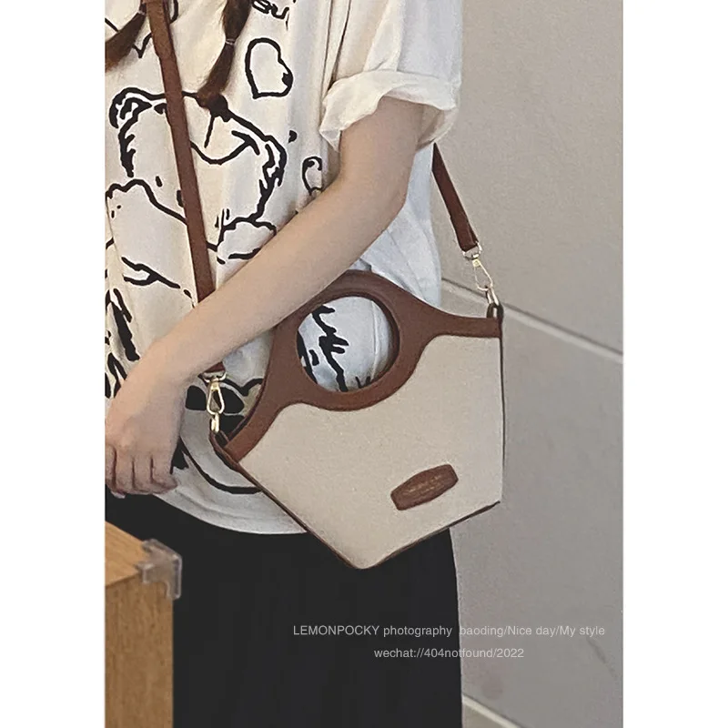 French minority design handbag bag female 2023 new fashion contrast stitching bucket bag high sense messenger bag