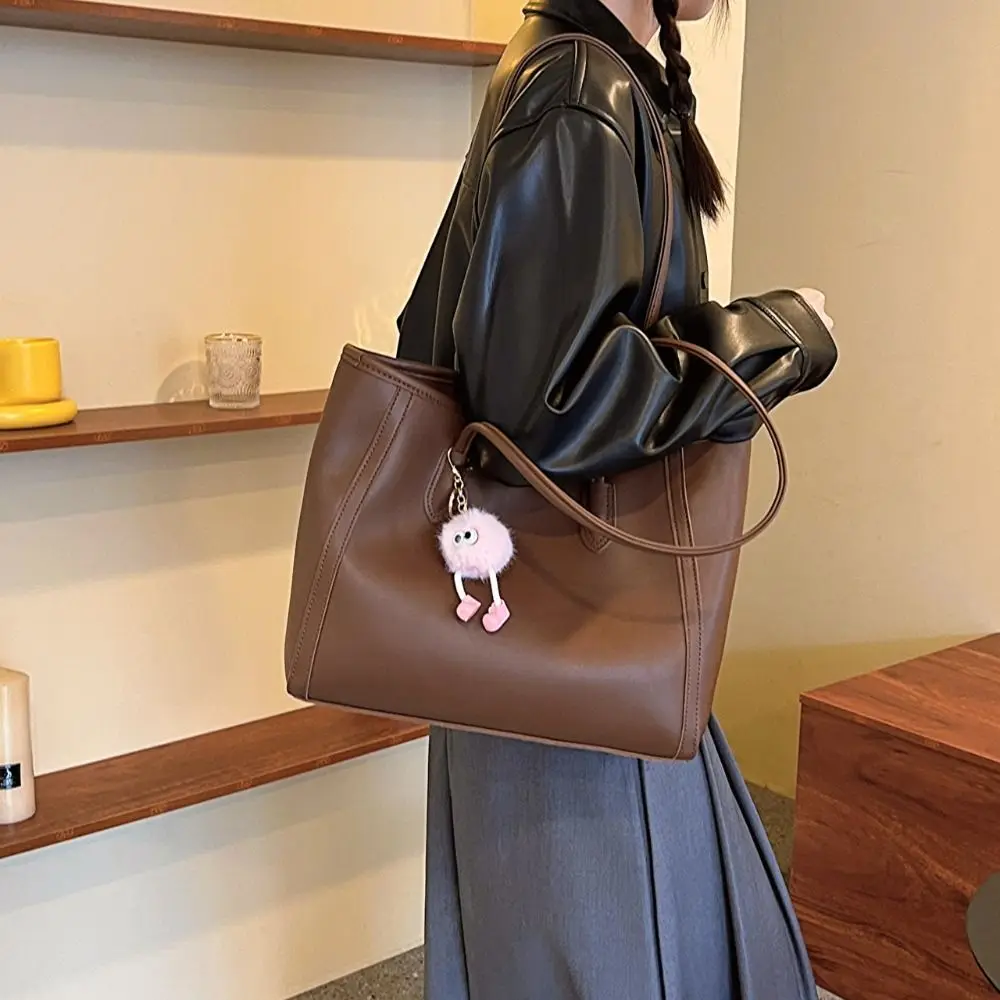 กระเป๋าถือสไตล์เกาหลีแบบพกพา กระเป๋าถือหนัง PU กระเป๋าสะพายใต้วงแขน สีพื้น เรียบง่าย เข้าได้กับทุกชุด กระเป๋าสะพายไหล่สำหรับเดินทาง