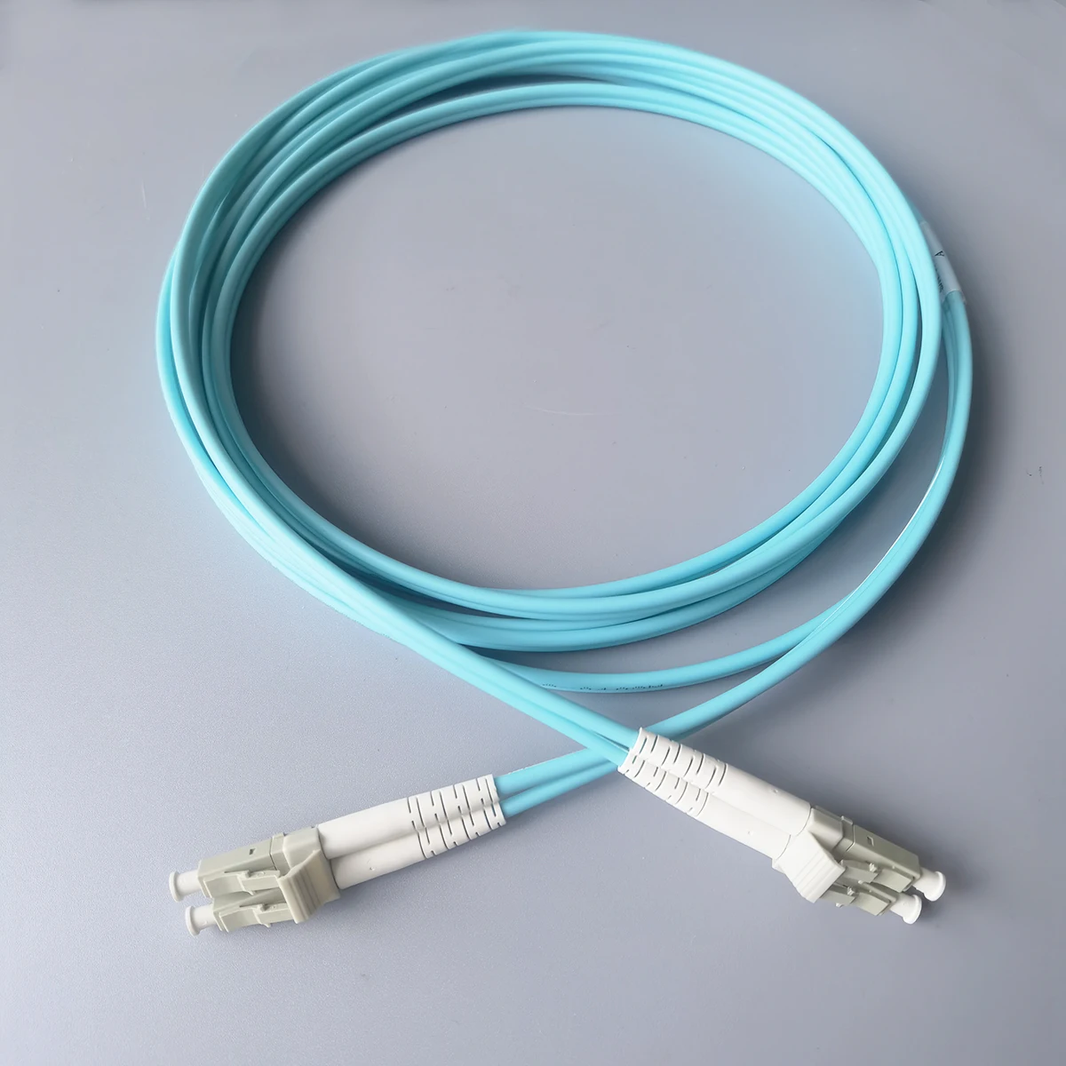 Om3 Indoor Optic Patch Snoer Kabel Duplex Multimode Diameter 3.0Mm Lc/UPC-LC-UPC Lszh Glasvezel Internet Kabel Verlengsnoer